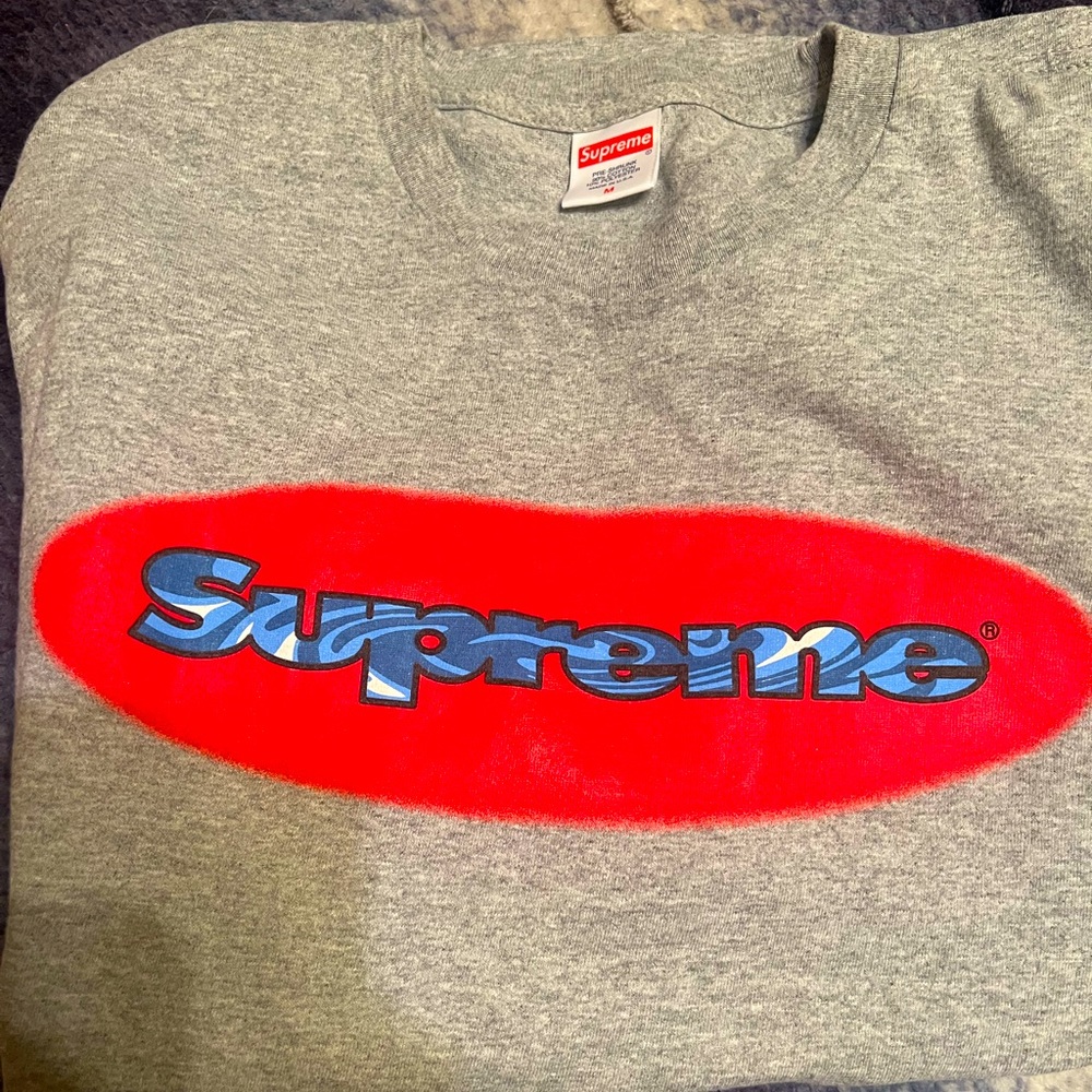 Authentic Supreme long sleeve elliptical logo shirt. Never worn